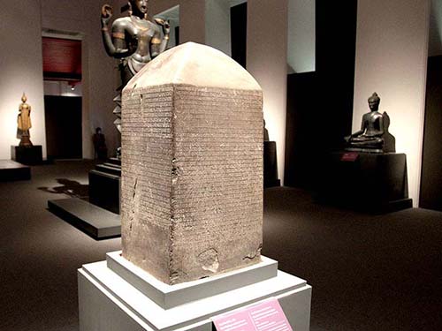 Milestone with scription in the National Museum.